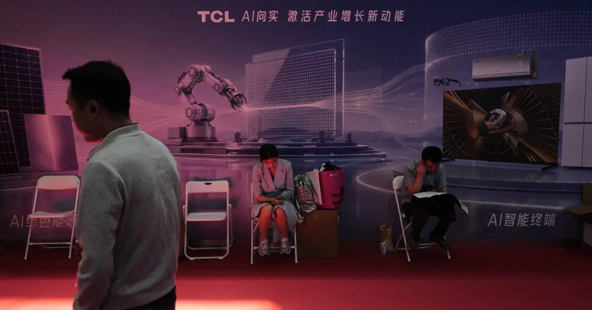 Laid off for a bot, China’s workers face an AI jobs squeeze